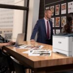 Xerox® C310 Farbdrucker Menschen Büro